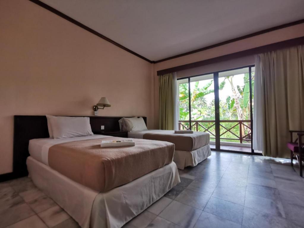 Oyo 89972 Borneo Paradise Beach Hotel Kota Kinabalu Exteriör bild